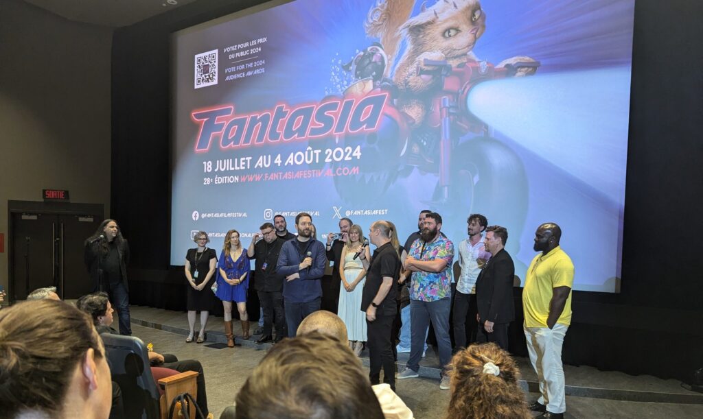 SLA at Fantasia: Shelby Oaks - Spoiler Free Movie Review Chris Stuckmann and Mike Flanagan with some of the cast and crew from Shelby Oaks.